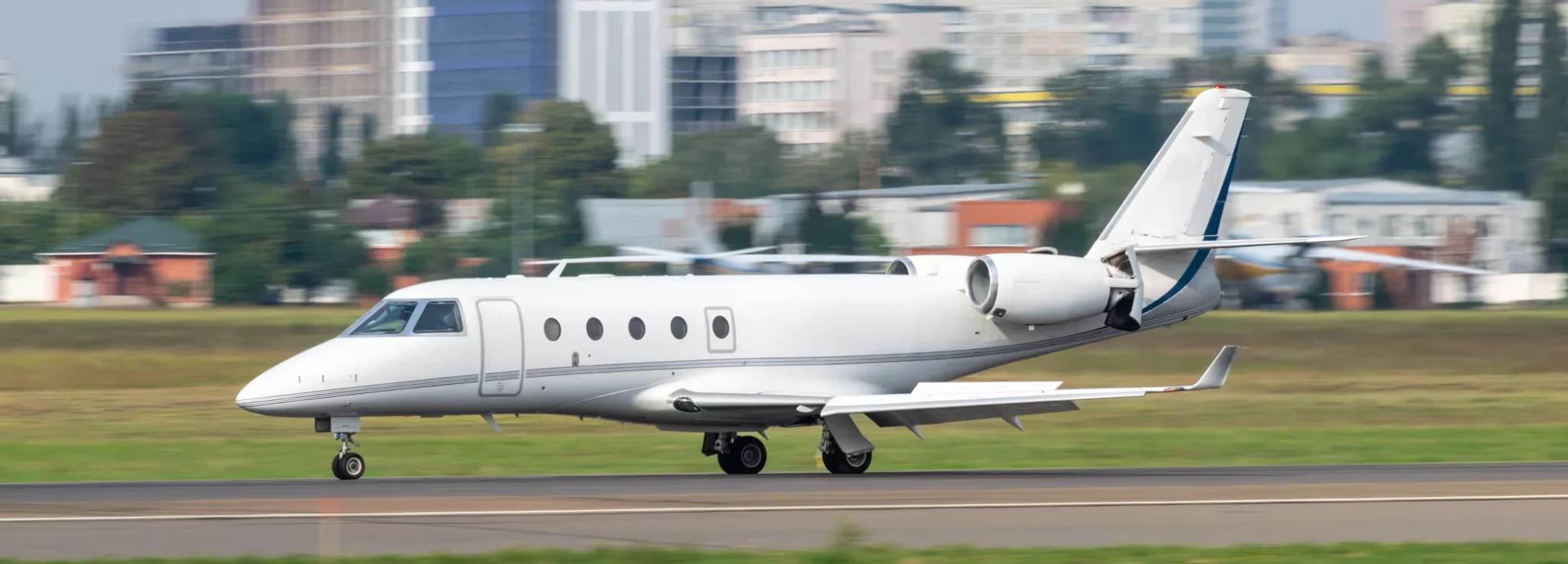 Gulfstream G150 private jet available for charter with Hogani Jets, featuring seating for up to 8 passengers, a 3,000 nautical mile range, and the widest cabin in the midsize jet category.