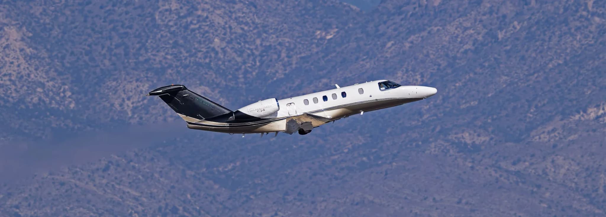 Cessna Citation CJ4 flagship light jet available for private charter through Hogani Jets on the airport apron
