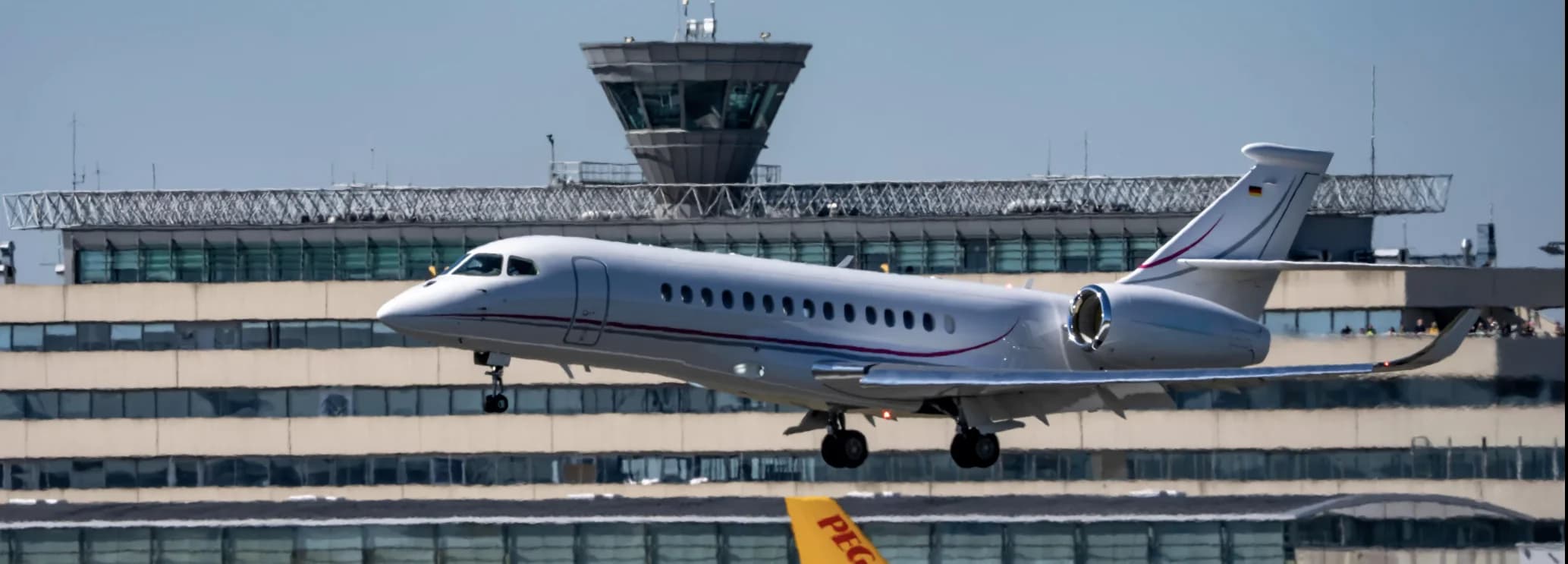 Exterior view of a Dassault Falcon 6X ultra widebody jet on the ramp