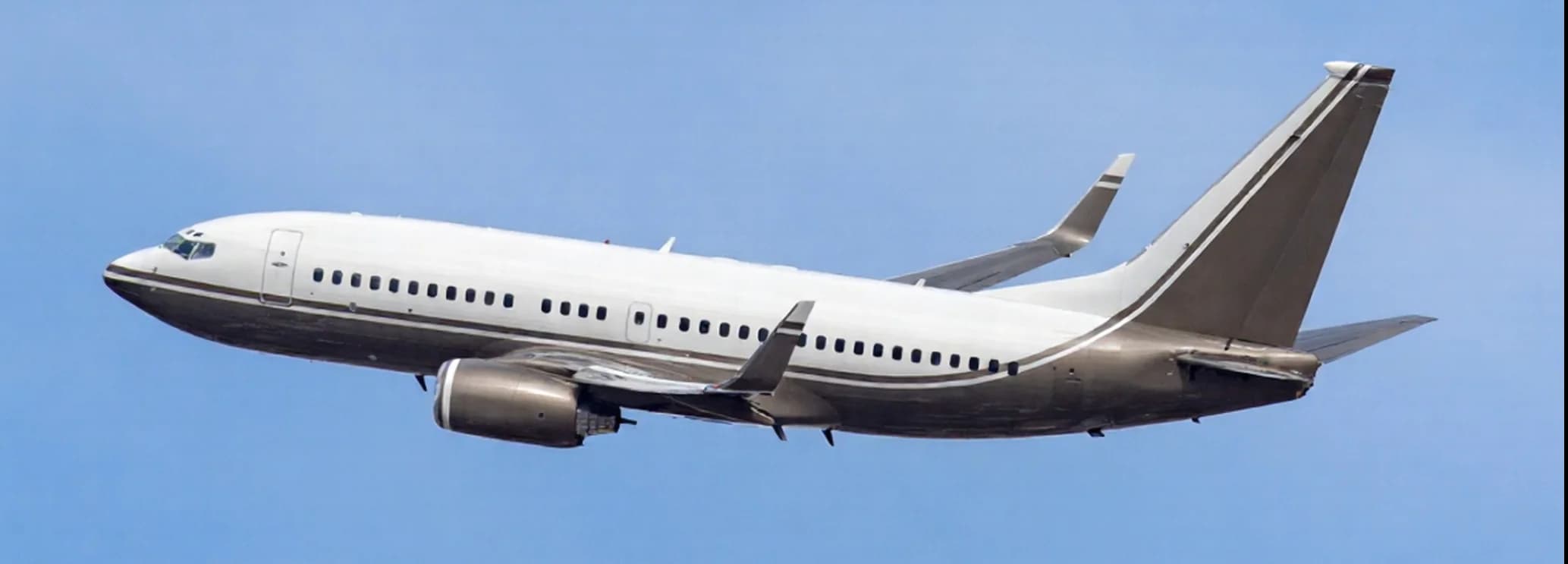 Boeing BBJ 3 737-900ER VIP airliner in flight showing the stretched fuselage that delivers the longest 114-foot cabin in the BBJ family