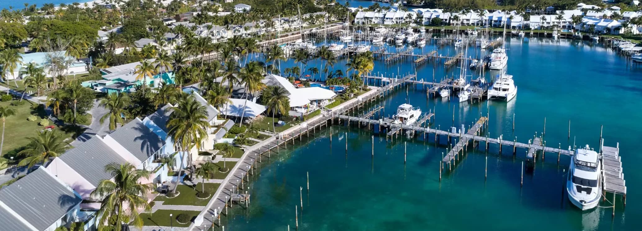 Treasure Cay Beach and marina in Abaco, Bahamas, popular with private jet travelers and yacht owners.