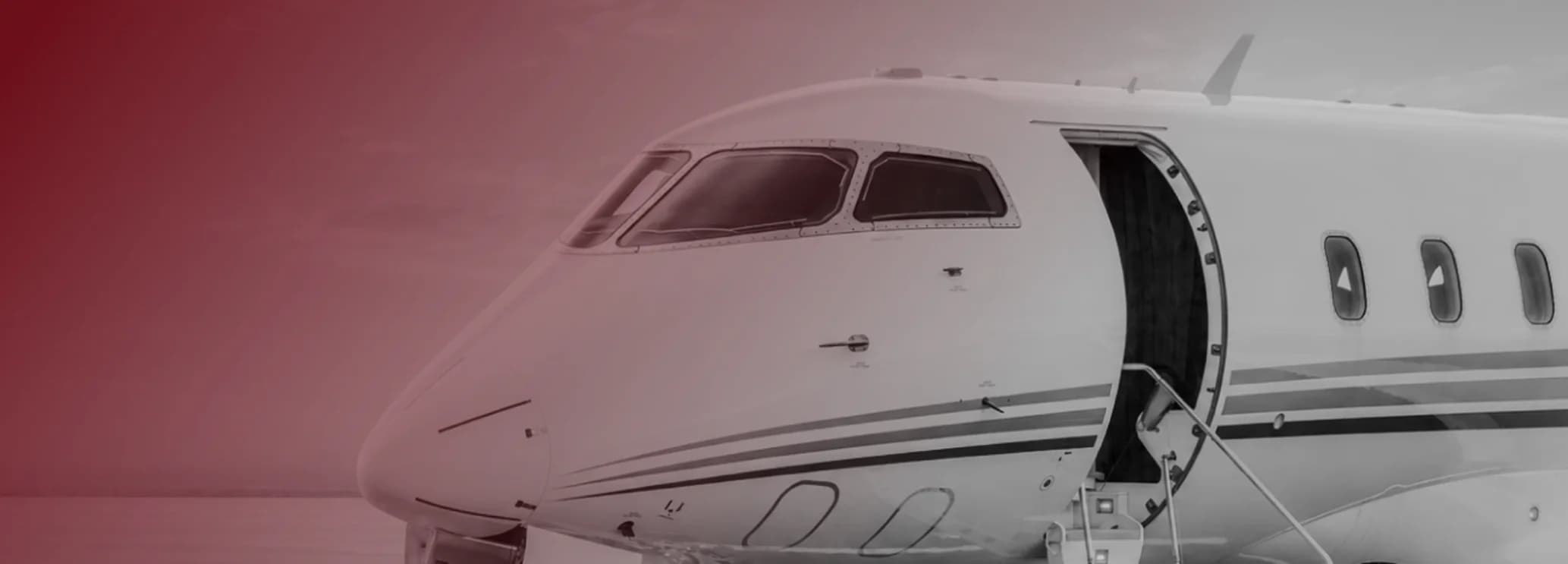 Luxury private jet parked at Hanscom Field near Boston after a nonstop charter flight from New York for business travelers.