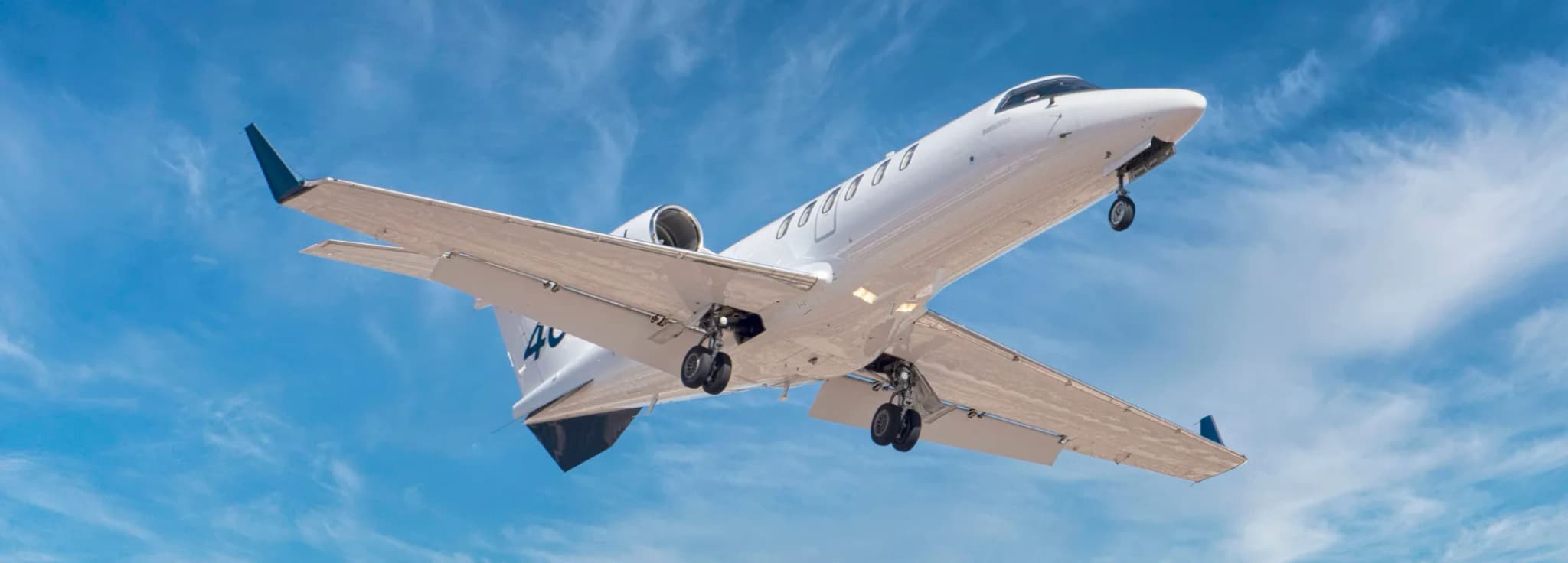 Bombardier Learjet 40XR modern light jet available for private charter through Hogani Jets on the airport ramp