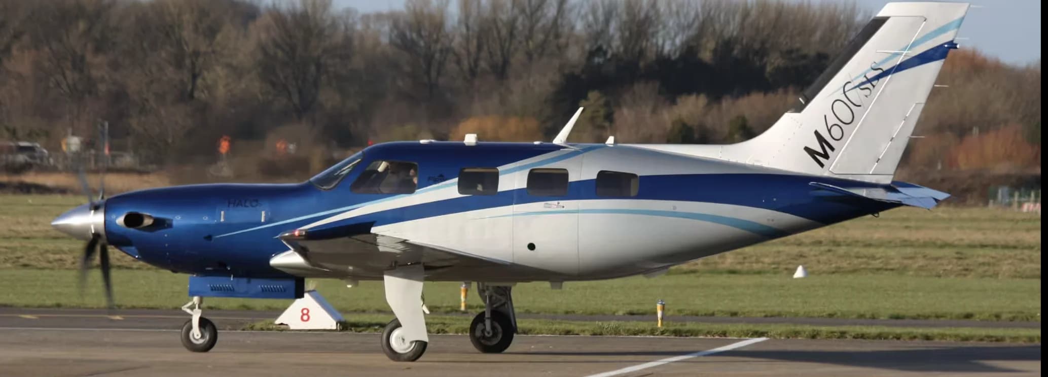 Piper M600 SLS single-engine turboprop aircraft parked on the runway apron