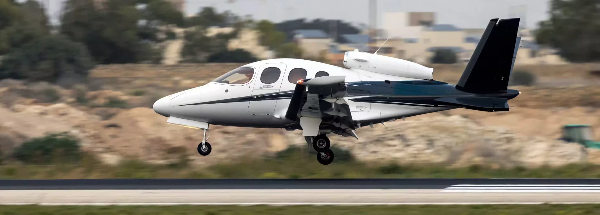 Cabin interior of Cirrus Vision Jet G2+ showing passenger seating and Garmin Perspective Touch+ avionics