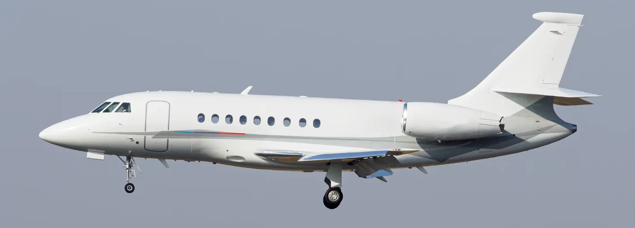 Exterior view of a Dassault Falcon 2000DX EASy private jet for super midsize jet charter available on the official Hogani Jets website