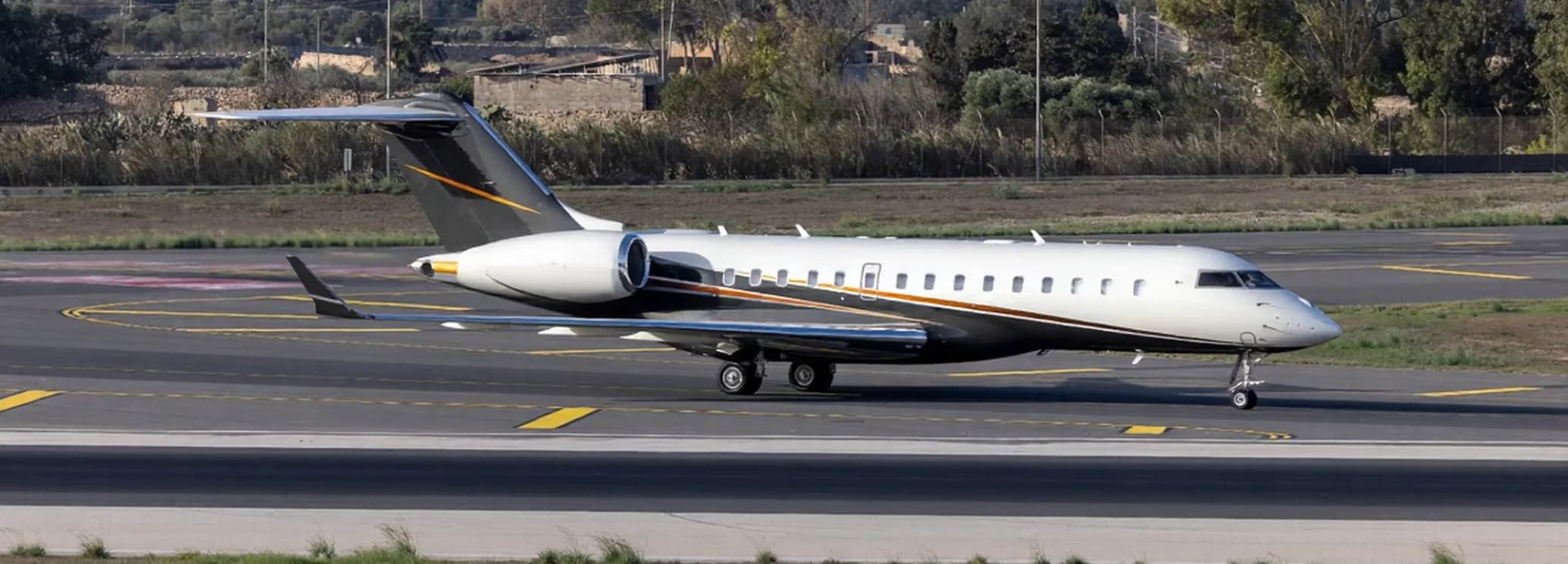Bombardier Global Express XRS three-zone luxury cabin interior with executive seating and dining table