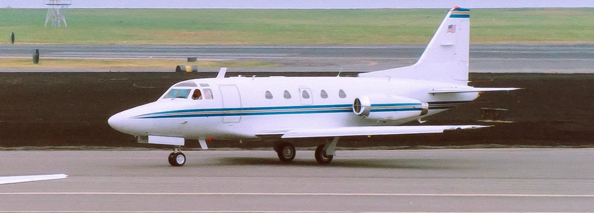 Sabreliner 60 midsize charter jet on the tarmac, built on F-86 Sabre fighter wing and tail, available to charter from $2,800 per hour
