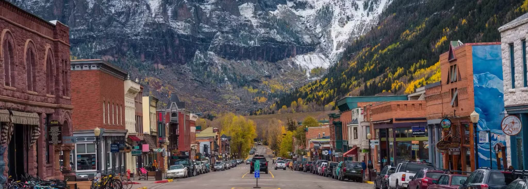 Private jet charter to Telluride, Colorado, with the San Juan Mountains and the box canyon behind